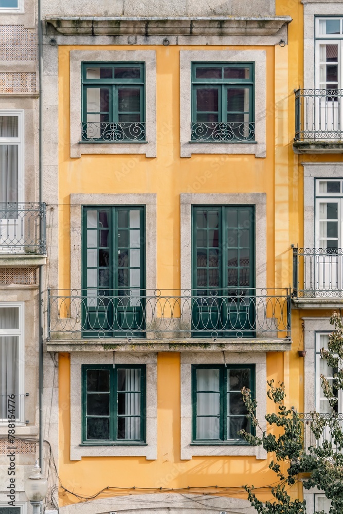 Typical facade of the buildings of the beautiful city of Porto, travel and monuments of Portugal. Next to the Douro river.