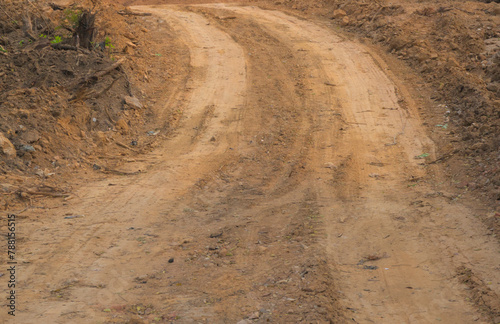 Tyre marks  on red mud or dirt road