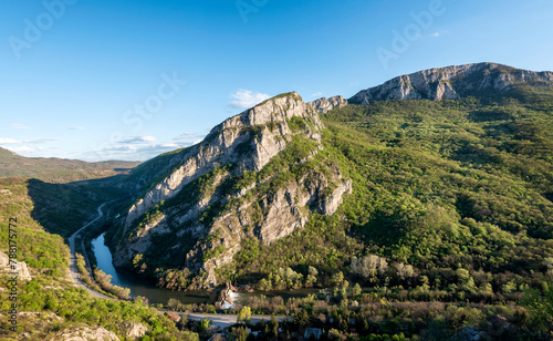 Sicevo Gorge (Sicevacka klisura) in Serbia. Mountains and river on early spring sunny day. The gorge in the middle of mountains. photo