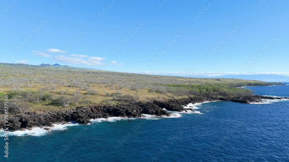 Aerial view of volcanic coastline in Hawaii Island, United States. Aerial view of volcanic coastline in Hawaii Island, United States.