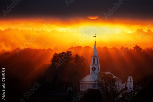 Sunrise over a church