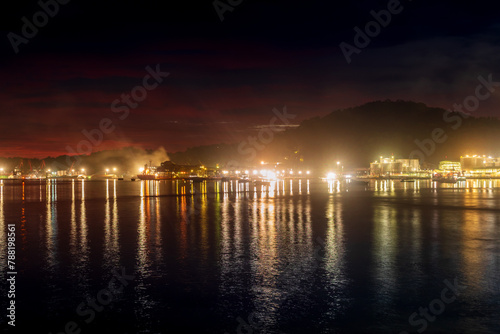 Night view at Teluk Bayur harbor, in Indonesia photo