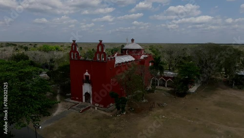 Aerial view of red church in Sotuta, Yucatan, Mexico. photo