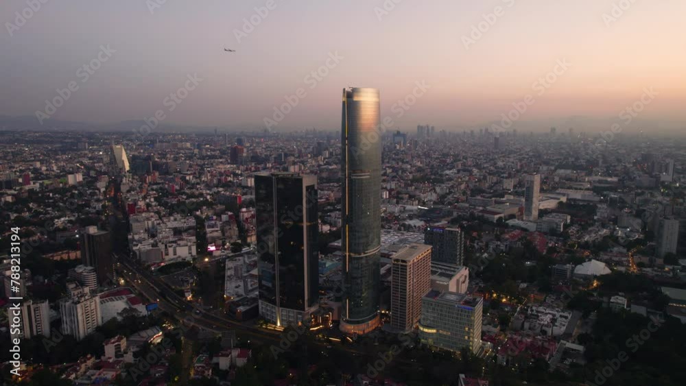 Aerial drone view of Mitikah building at sunrise in Mexico City, Mexico. Aerial drone view of Mitikah building at sunrise in Mexico City, Mexico.
