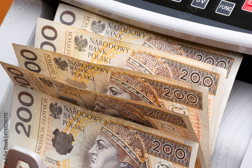 Polish money in a counting machine photo