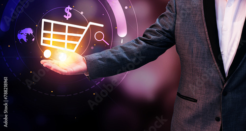 Online Shopping and E-Commerce Concept Background with Shopping cart hovering over colorful glowing hand. Modern and future of online shopping background