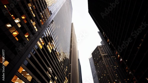 Witness the breathtaking allure of the New York City skyline at night, as towering skyscrapers illuminate the urban landscape.