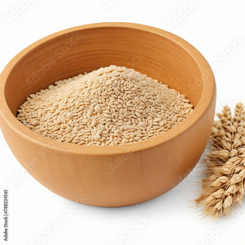 Wheat grain and Ear in wooden bowltop, cut out on white background photo