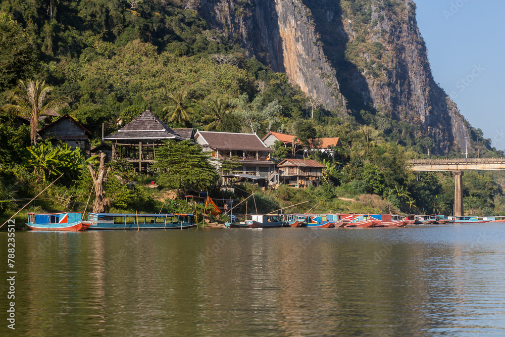Fototapeta premium Riverside houses in Nong Khiaw, Laos
