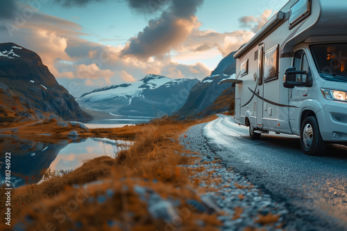 Motor home rides on the road among the mountains and rivers. Road trip © Sergio
