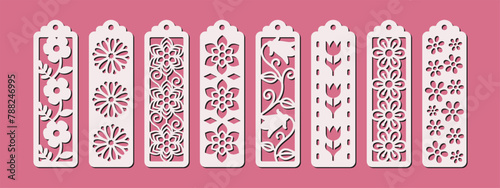 Set of 8 vertical bookmarks with floral pattern. Laser cut template. Decorative bookmark stencil for paper, wood and metal cutting. Vector design with flowers. photo