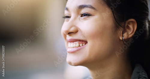 Happy, smile and headshot of Asian woman outdoor in city, urban town and street with blurry background in China. Excited, student and closeup of gen z girl with vision for freedom, calm and relax