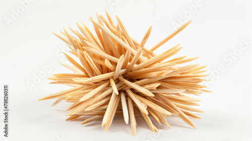 Bunch of wooden toothpicks isolated on white photo