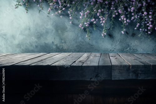 Tavolo di Legno Vuoto di Fronte a un Sfondo di Fiori del Giardino- Atmosfera Perfetta per Esposizione di Prodotti photo