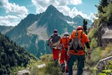 Rescuers carry a mountain tourist in equipment on a stretcher