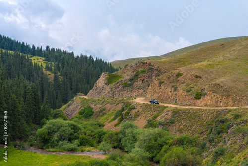 Mountain road with car. Beautiful nature of Kazakhstan near Almaty