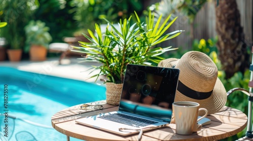 Laptop mockup with coffee cup on pool deck. Virtual office with poolside relaxation.
 photo