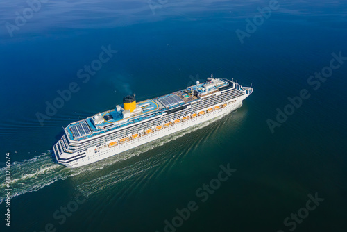 Aerial view of cruise ship in sea. Cruise liner sailing the ocean or sea on a sunny summer day
