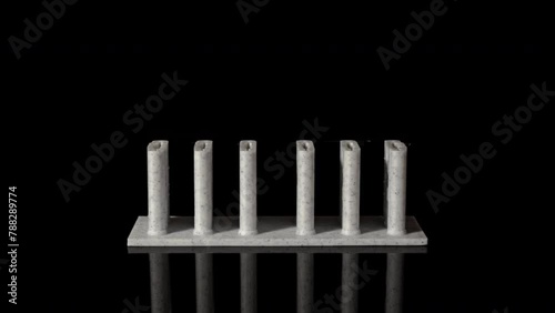 3D printer printing Brandenburg Gate time lapse on pure black background