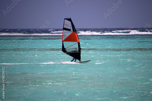 Windsurfing in turquoise lagoon water, Lac Bay, Bonaire, Caribbean Netherlands