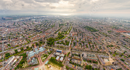 Amsterdam  Netherlands. Panorama of the city on a summer morning in cloudy weather. Aerial view