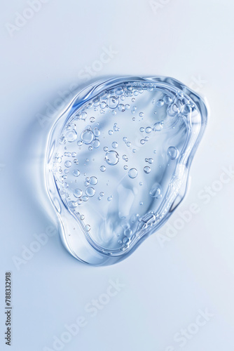 Vertical Close up Clear liquid cosmetic product. Gel texture with bubbles, skin care prodict. © Hunman
