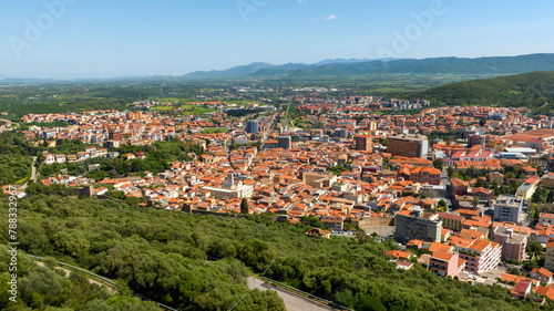 Aerial view of Iglesias, an Italian municipality. It is located in southwestern Sardinia, Italy, in the Iglesiente region. It was one of the royal cities of the island and stands among the hills.