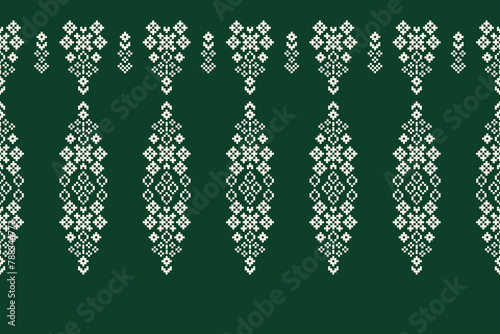 Traditional ethnic motifs ikat geometric fabric pattern cross stitch.Ikat embroidery Ethnic oriental Pixel green background. Abstract,vector,illustration. Texture,scarf,decoration,wallpaper.