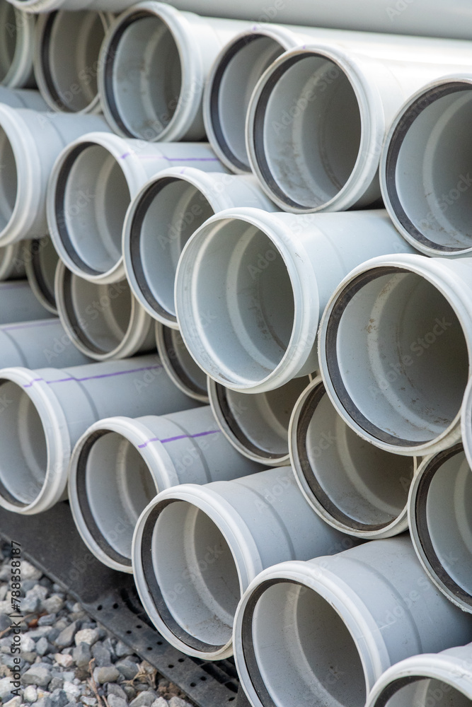 PVC pipes stacked in warehouse. High quality photo PVC pipes stacked in warehouse. High quality photo