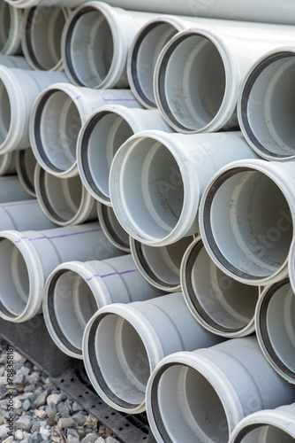 PVC pipes stacked in warehouse. High quality photo