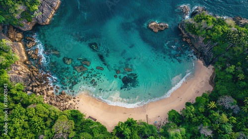 Aerial view of a secluded cove with azure waters, an idyllic escape for beachgoers