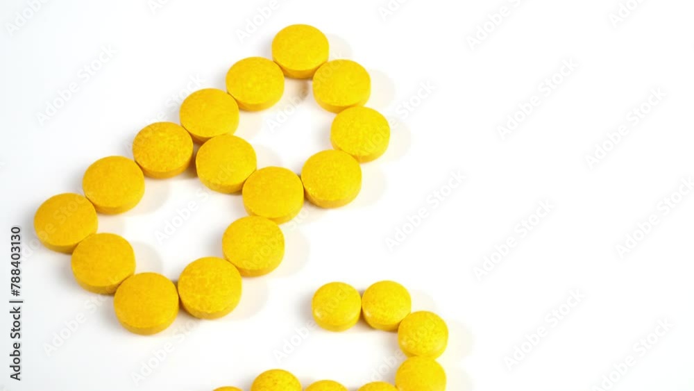 Vitamin B Pills isolated - B2 on white background Vitamin B Pills isolated - B2 on white background