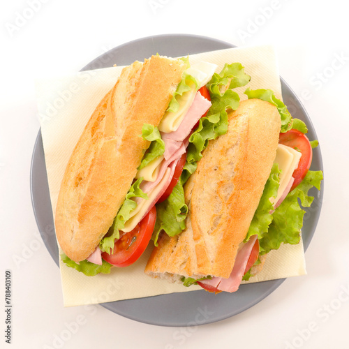 baguette sandwich with cheese, ham, tomato and lettuce