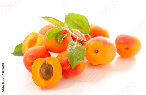 fresh apricot and leaf on white background