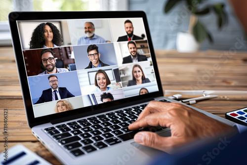 Virtual meeting online. Video conference by laptop. Online business meeting. On the laptop screen, people who gathered in a video conference to work on-line
 photo