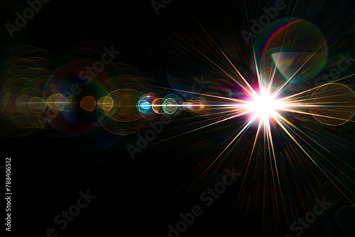 Easy to add lens flare effects for overlay designs or screen blending mode to make high-quality images. Abstract sun burst, digital flare, iridescent glare over black background
 photo