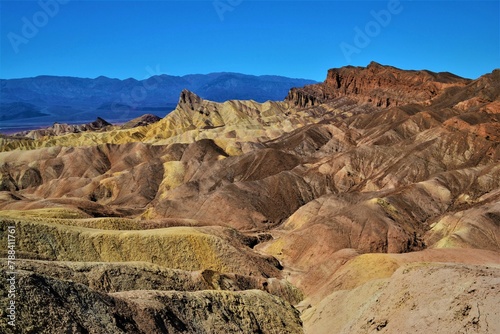 Zabriskie Point - view of erosional landscape composed of sediments from Furnace Creek Lake, which dried up 5 million years ago (Death Valley National Park, California, United States) photo