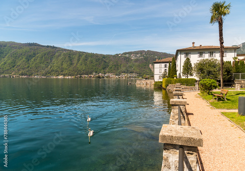 Lake Lugano promenade in Bissone in a springtime, district of Lugano, Ticino, Switzerland.