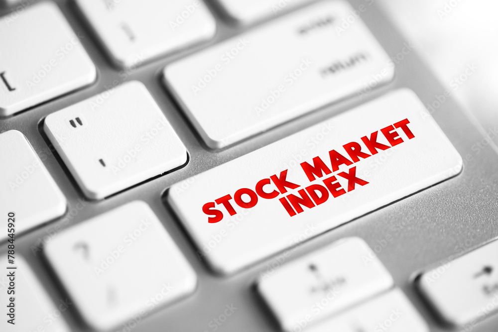 Fototapeta premium Stock Market Index is an index that measures a stock market, that helps investors compare current stock price levels, text concept button on keyboard