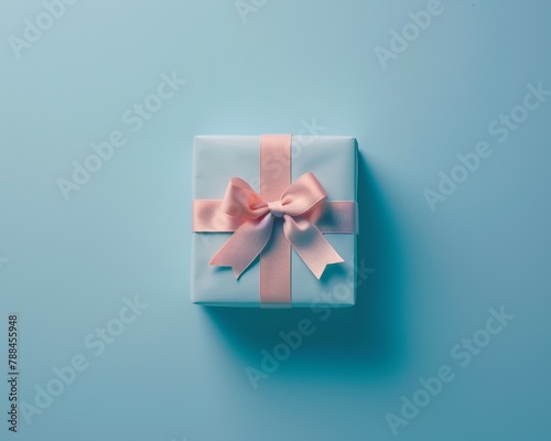 Minimalist design of a gift box with a sleek ribbon, standing out on a flat