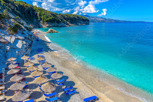 watching the Adriatic Sea in the crystal clear bathing area of Pulebardha beach in the town of Ksamil-Albania.