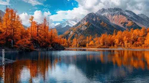 landscape of a lake with big mountains in autumn