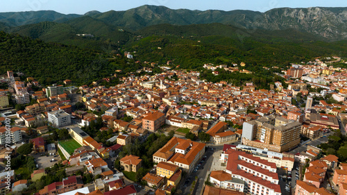 Aerial view of historic center of Iglesias, an Italian municipality. It is located in Sardinia, Italy, in the Iglesiente region. It was one of the royal cities of the island and stands among the hills