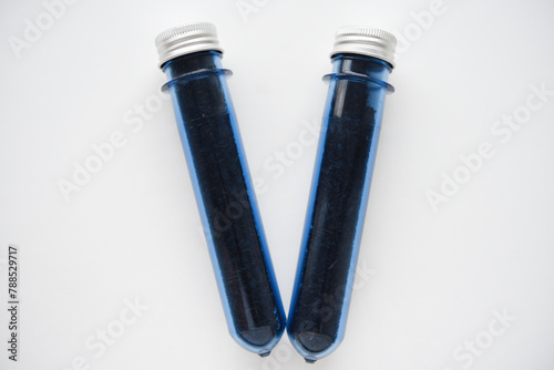 Two blue plastic flasks with a shiny lid. Flasks with tea inside.