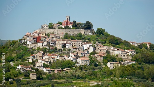 Historic town of Motovun on green hill panoramic view, Istria region of Croatia photo