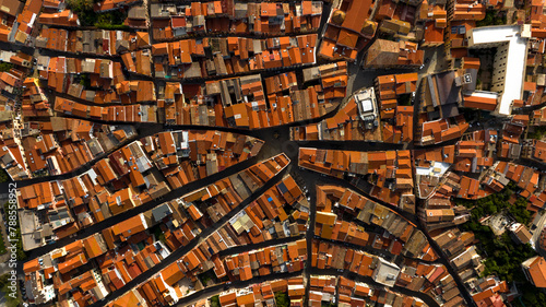 Tablou pe pânză Aerial zenith view of the streets and alleys of the historic center of Iglesias, Italy