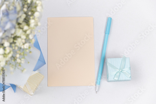 Greeting card and bouquet of flowers. Congratulations on the holiday, place for text