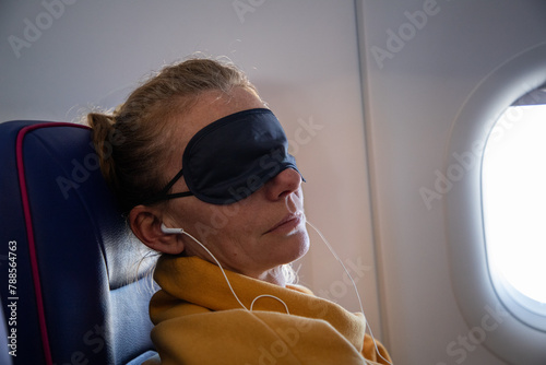 woman sleeping during a flight