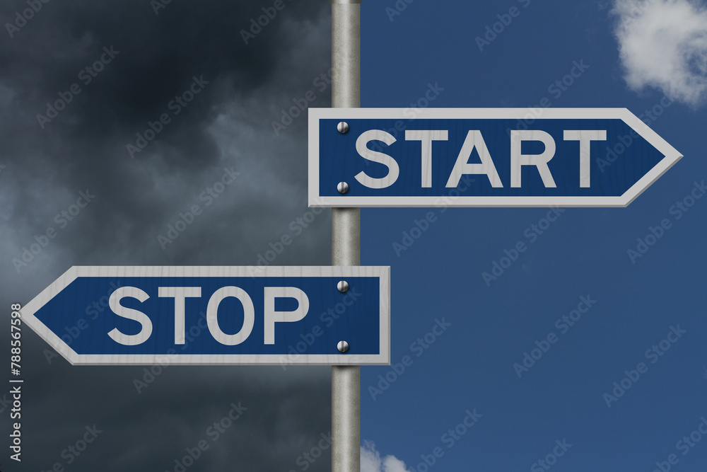 Fototapeta premium Stop Start message on blue street stop sign