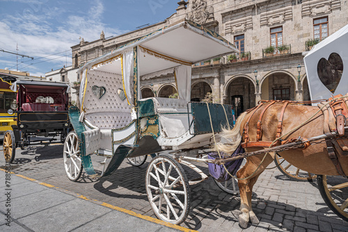 Antique carriage found in Guadalajara, Mexico.
Old fashioned carriage used as a transport in downtown.
